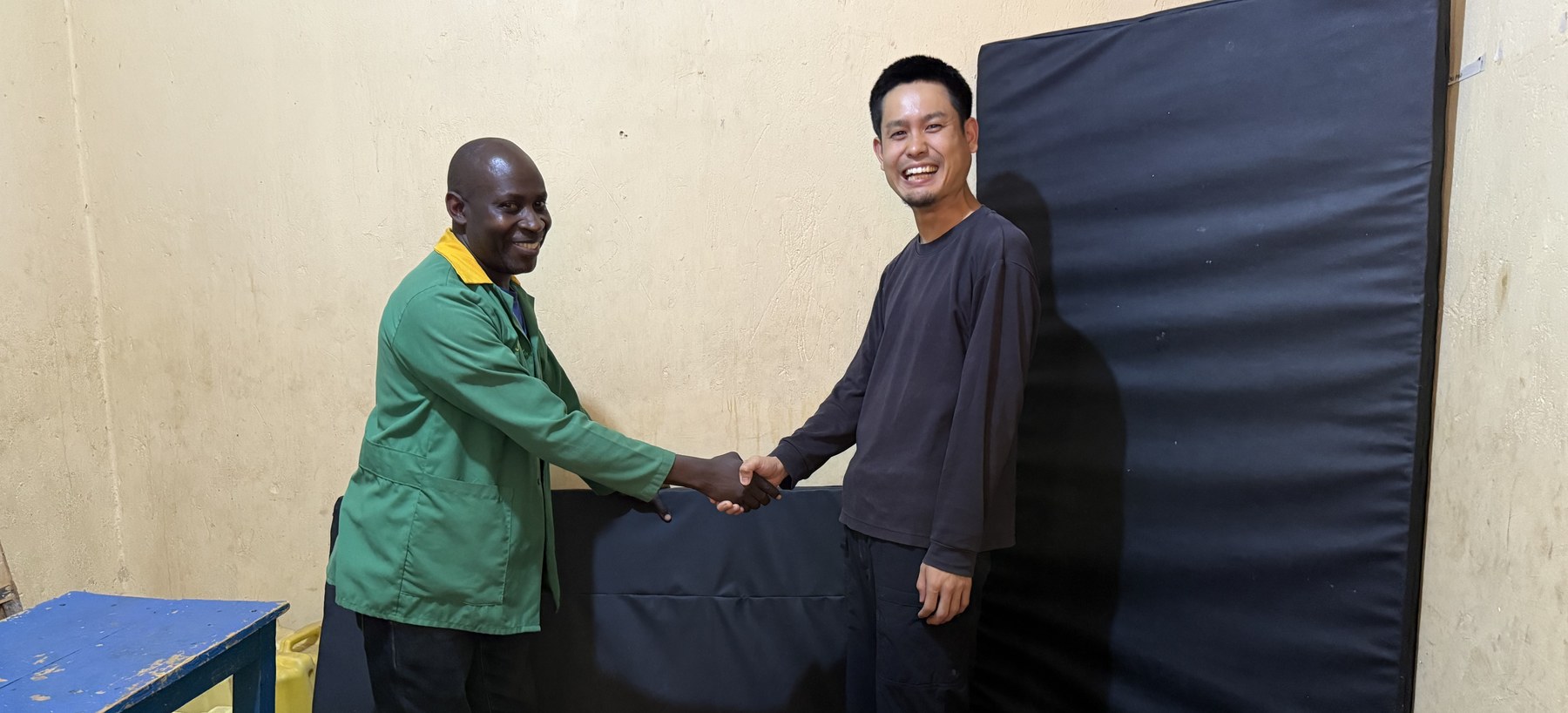 Kake and a CeSA staff member with the new therapy mats
