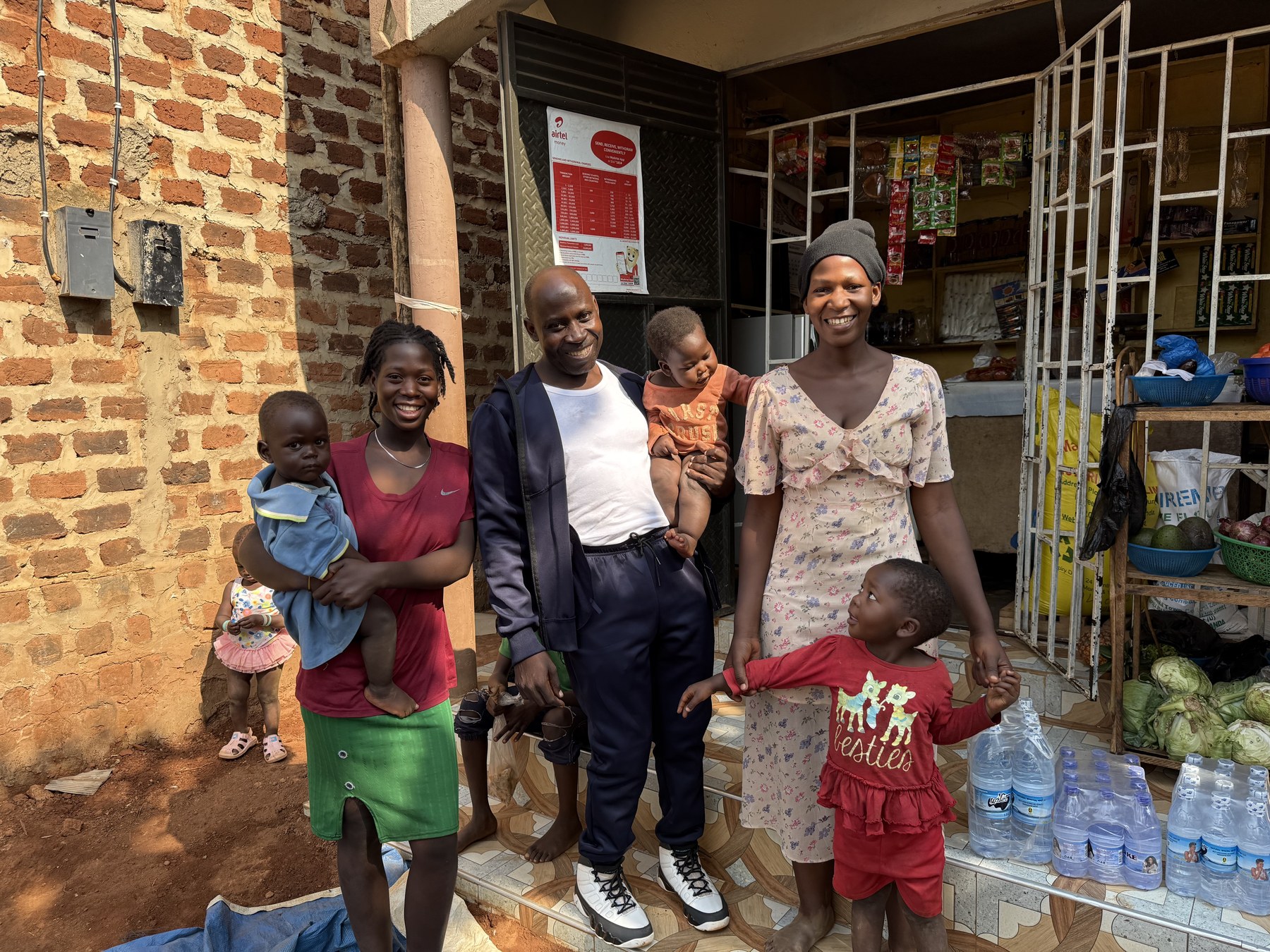 A family CeSA works with, together outside their home