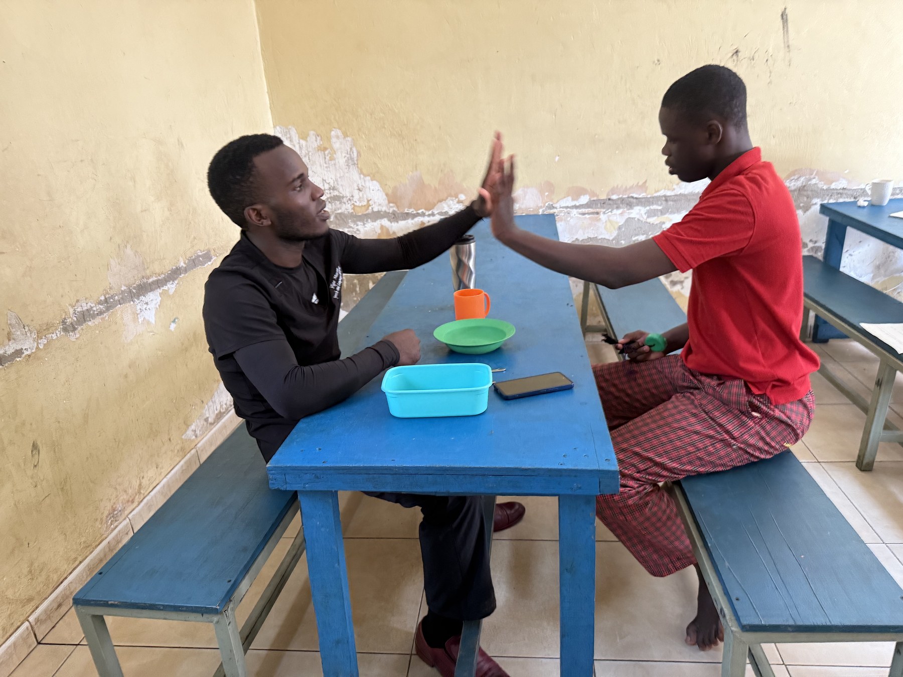 Two people sharing a high-five during a session at CeSA